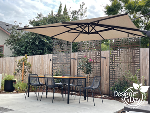Deluxe umbrella for covered outdoor living landscape design.