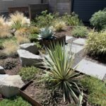 Great example of using different greens and browns in a colorful NW landscape design.