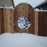 Custom iron gate in snow