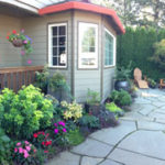 Janet loves sitting out in her patio garden and also seeing the color explosion from her dining nook.